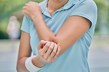Tennis and golfer's elbow treatment at Dr. Oswald Chiropractic in Medford, NJ